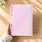 Agenda 2027 de semana vista con portada rosa pastel y tres tulipanes blancos, diseñada y encuadernada a mano.